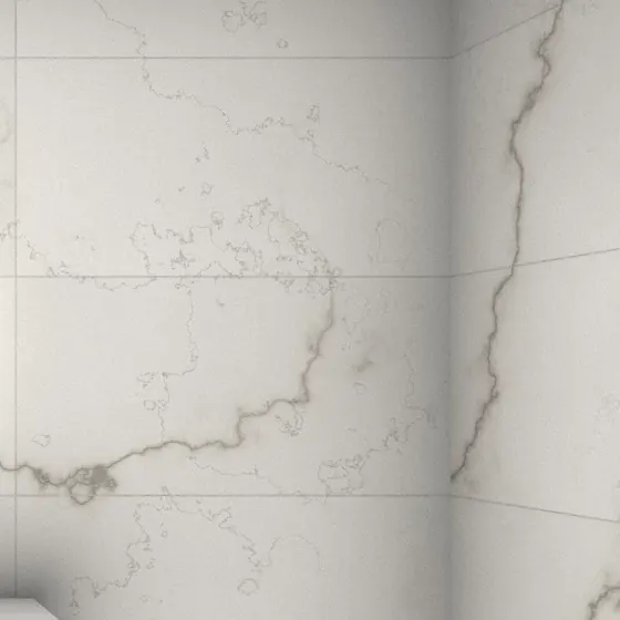 Close-up of marble-look tiles where the veining continues across a 2 mm joint